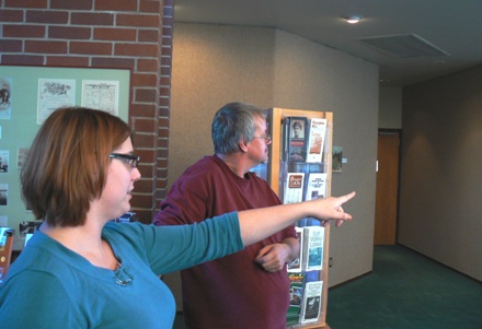 Reception participants discuss plein air work Nov. 29th