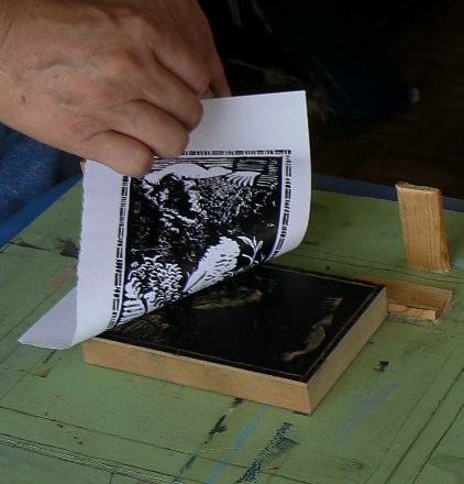 Proofing Moss Creek linocut